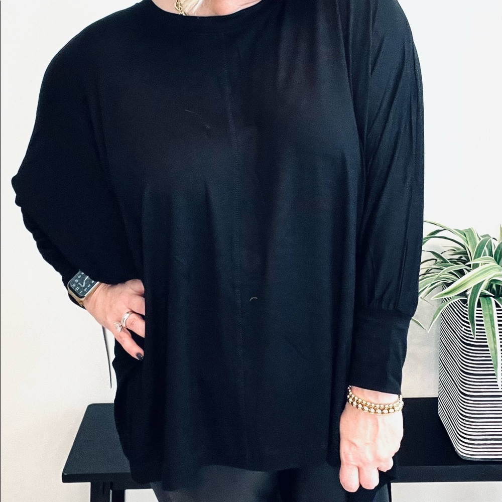 Oversized shark bite dolman top in black